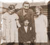 Ann, Hilda, and Edith Bass with Ernie Williams  - click for larger image